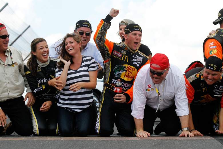 Jamie McMurray celebrating a July 2010 victory with his wife Christy and team members. (Getty)