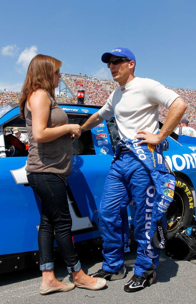 Jamie McMurray talks to his wife Christy before the CARFAX 400 at Michigan International Speedway in August 2010. (Getty)